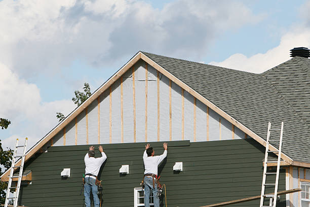 Professional Siding technician working in Dilliner, PA